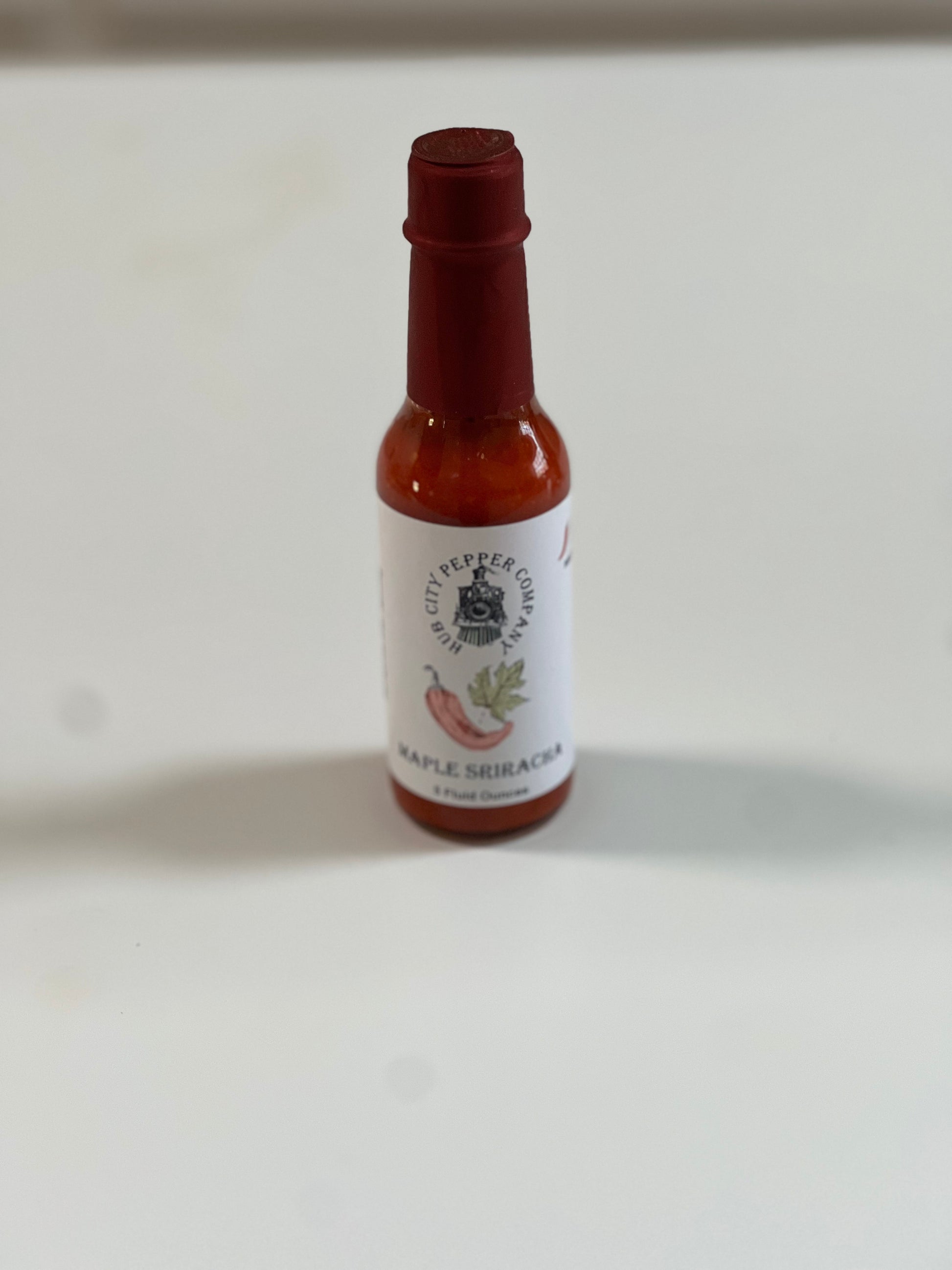 Maple Sriracha Hot Sauce front view elevated