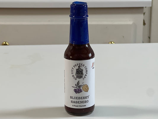 Blueberry Habanero Hot Sauce. perfect for dessert or put it on chicken. Sweet, Spicy and wonderful! Close up.