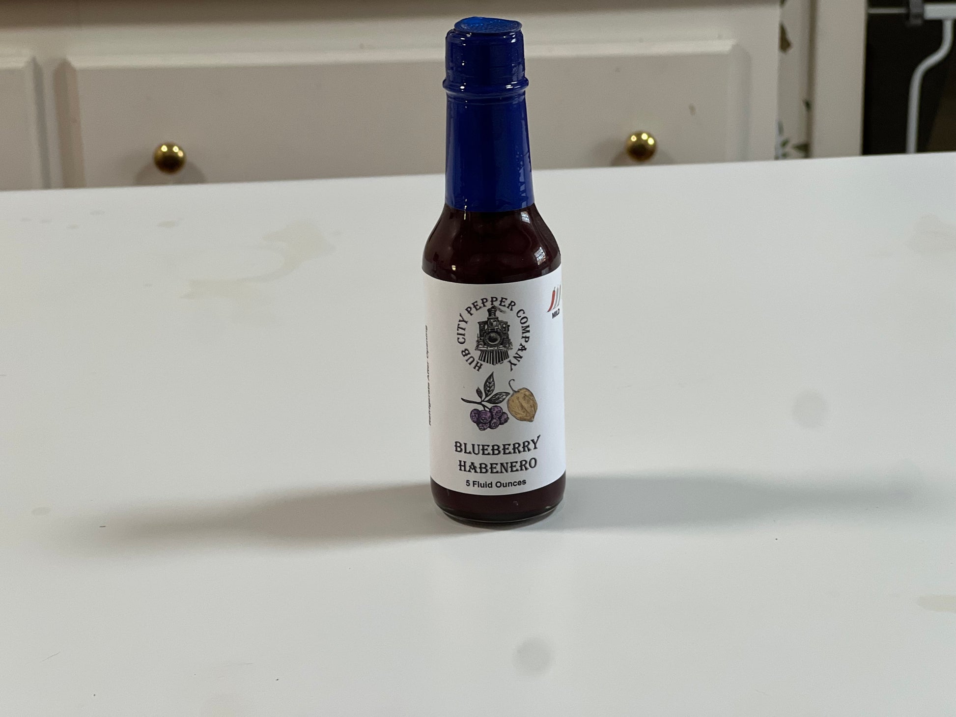 Blueberry Habanero Hot Sauce. perfect for dessert or put it on chicken. Sweet, Spicy and wonderful! Close up. Tight shot.